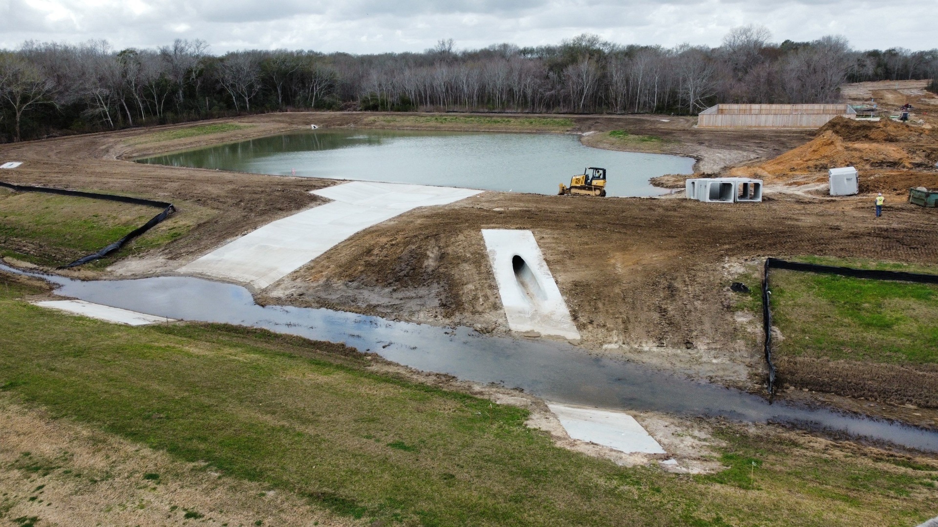Concrete culvert installation and storm water spillway by Lone Star JC Construction